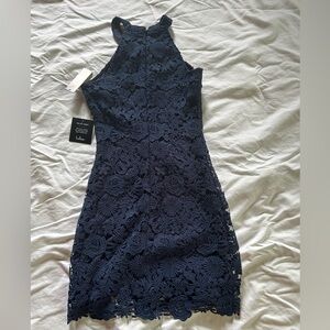 Lulus Love Poem Navy Blue Lace Mini Dress. Never wore with tags. Size XS.
